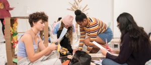 art students working on arts and crafts in the classroom