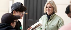 theater instructor teaching students in the studio