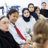 Students gathered in a conference room