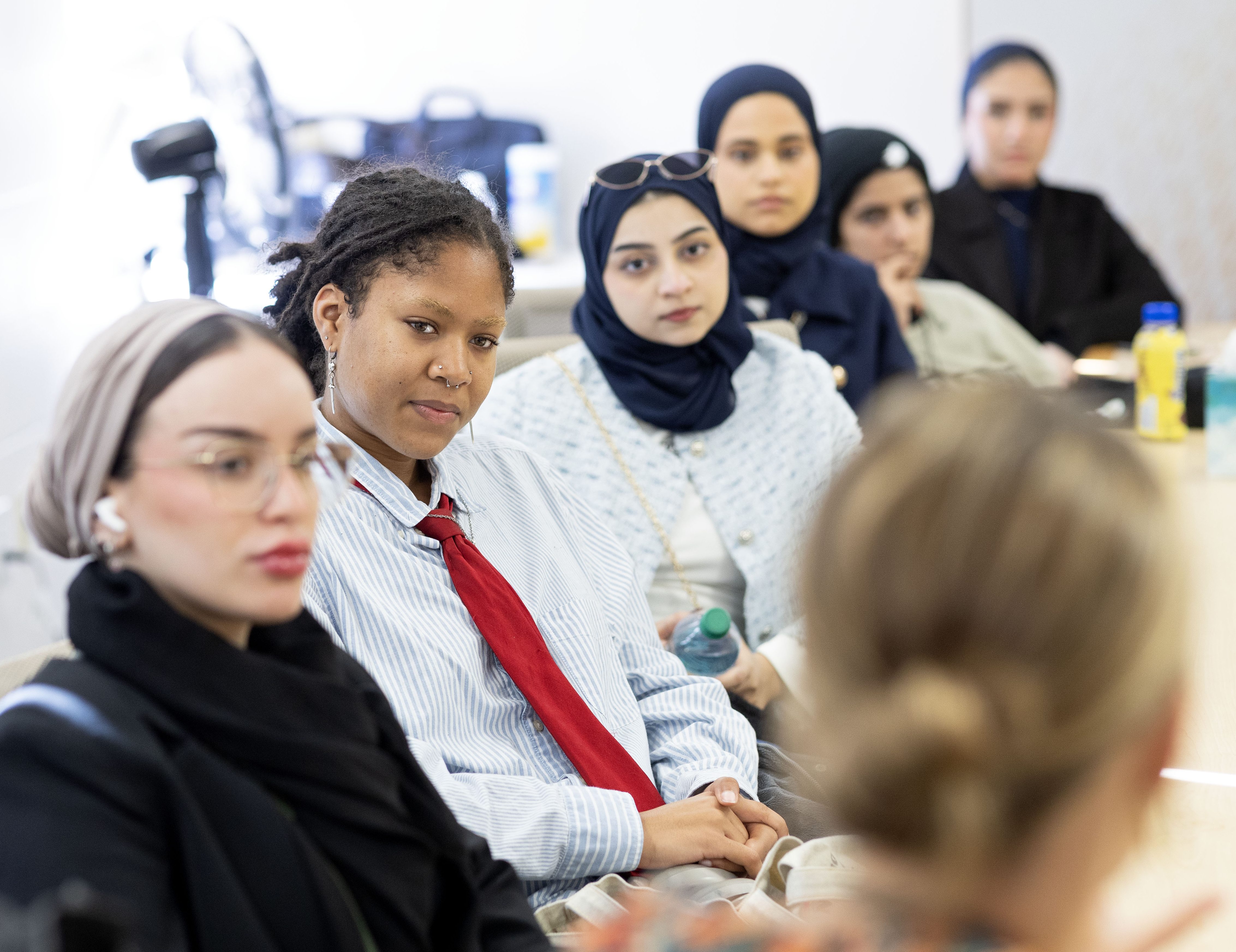 Students gathered in a conference room