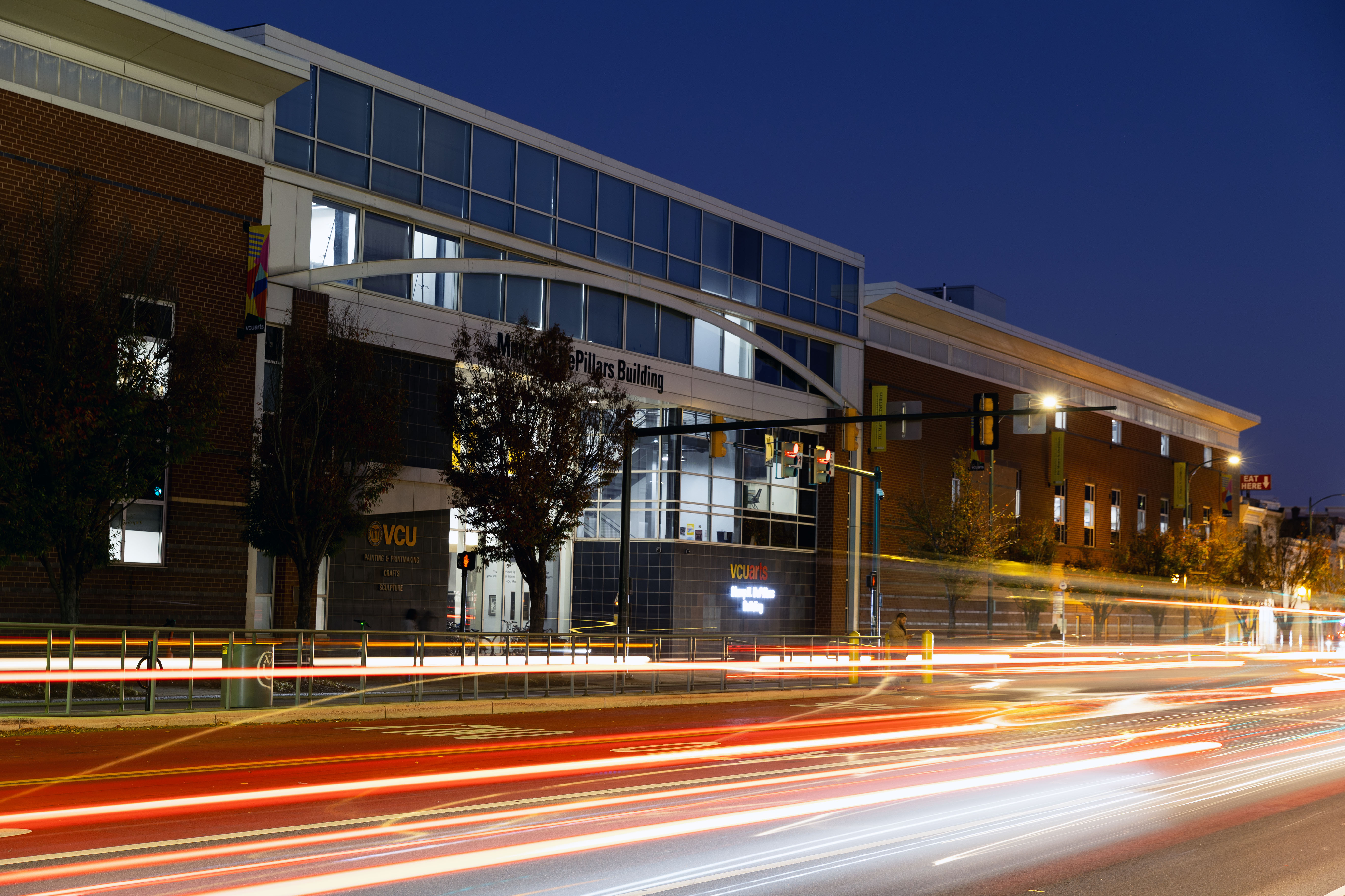 A nighttime view of the DePillars building