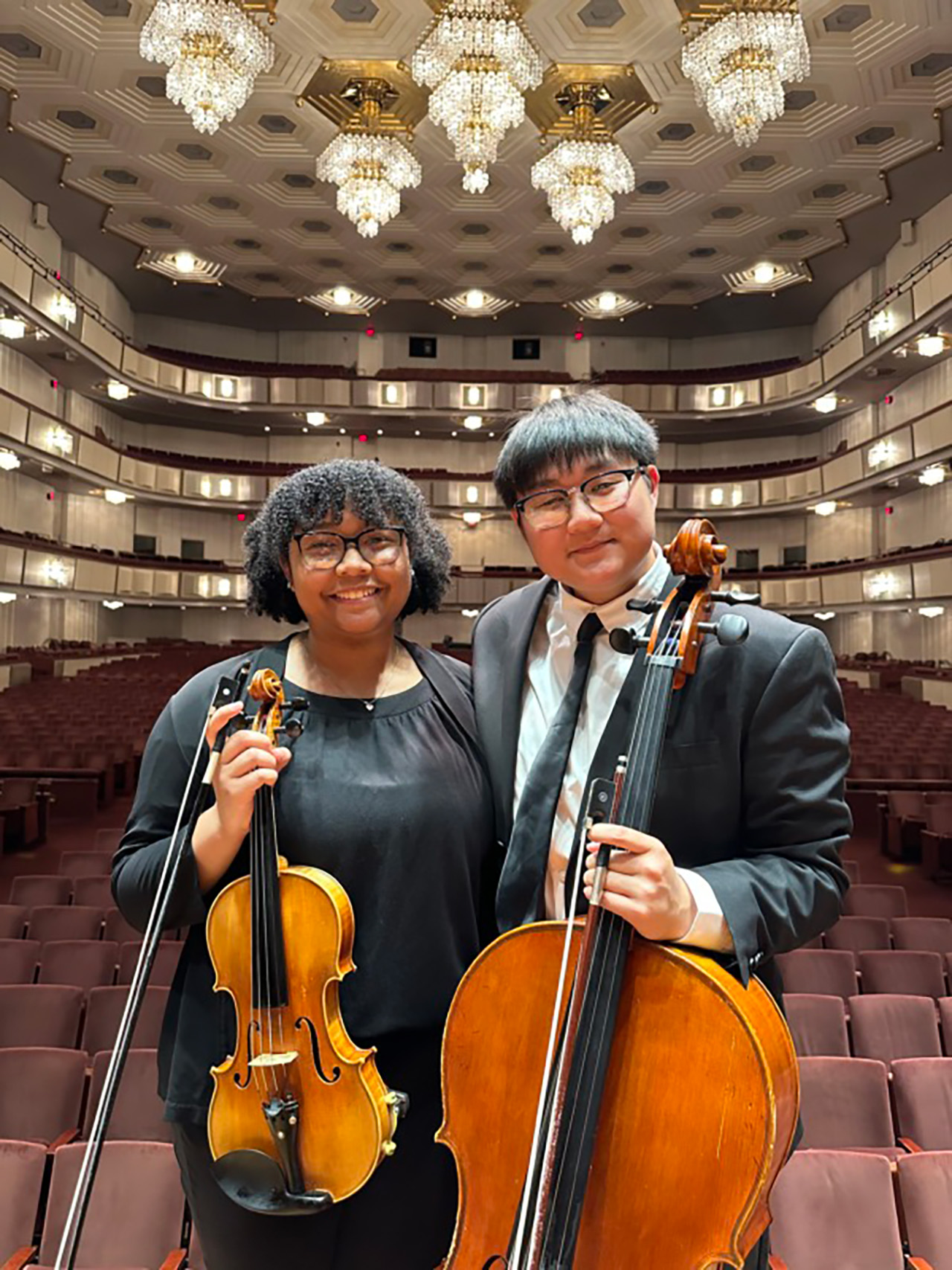 Arianna and Kevin with their instruments.