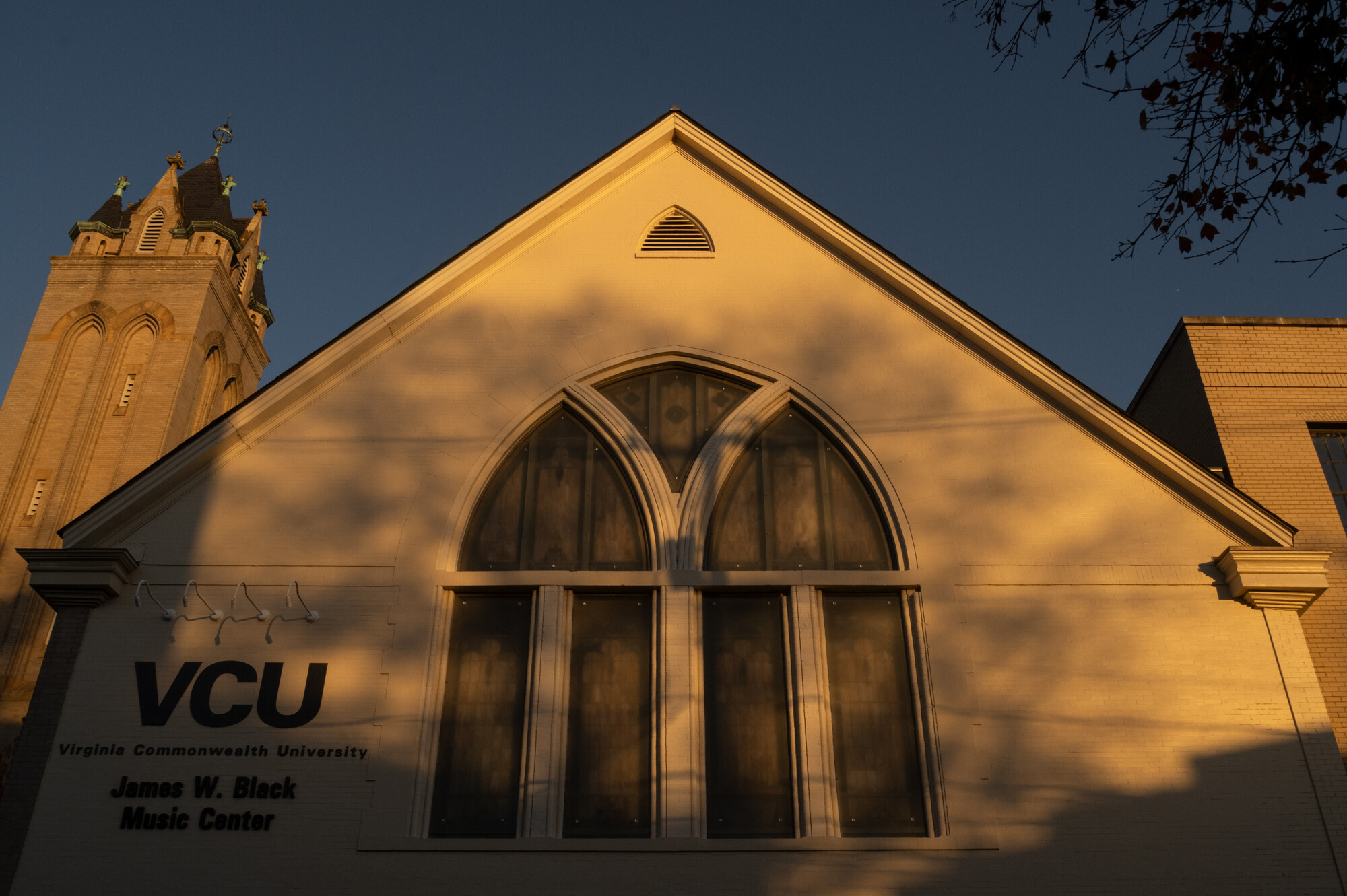 Fall Foliage and evening light at the James W. Black Music Center on VCU Campus.