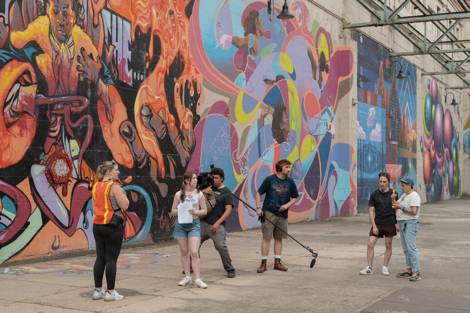 Summer Intensive Cinema Students filming Prety When You Die, a film that explores the not too hidden underbelly of influencer culture at the Canal Walk Murals.