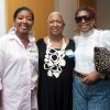 group of three women posing at v c u arts fashion show