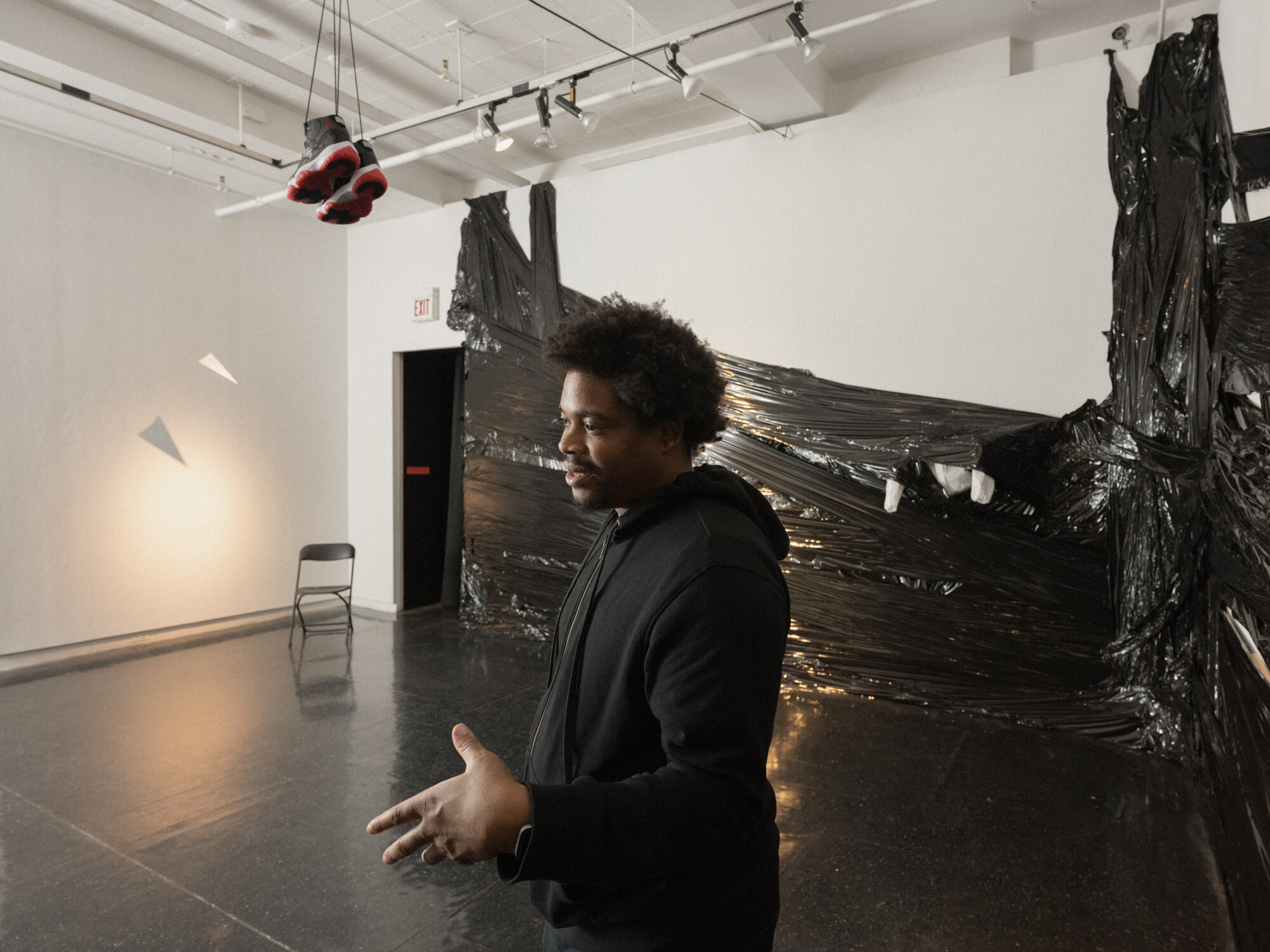 Sculpture + Extended media graduate student Jermaine Ollivierre photographed in his Graduate Studio.