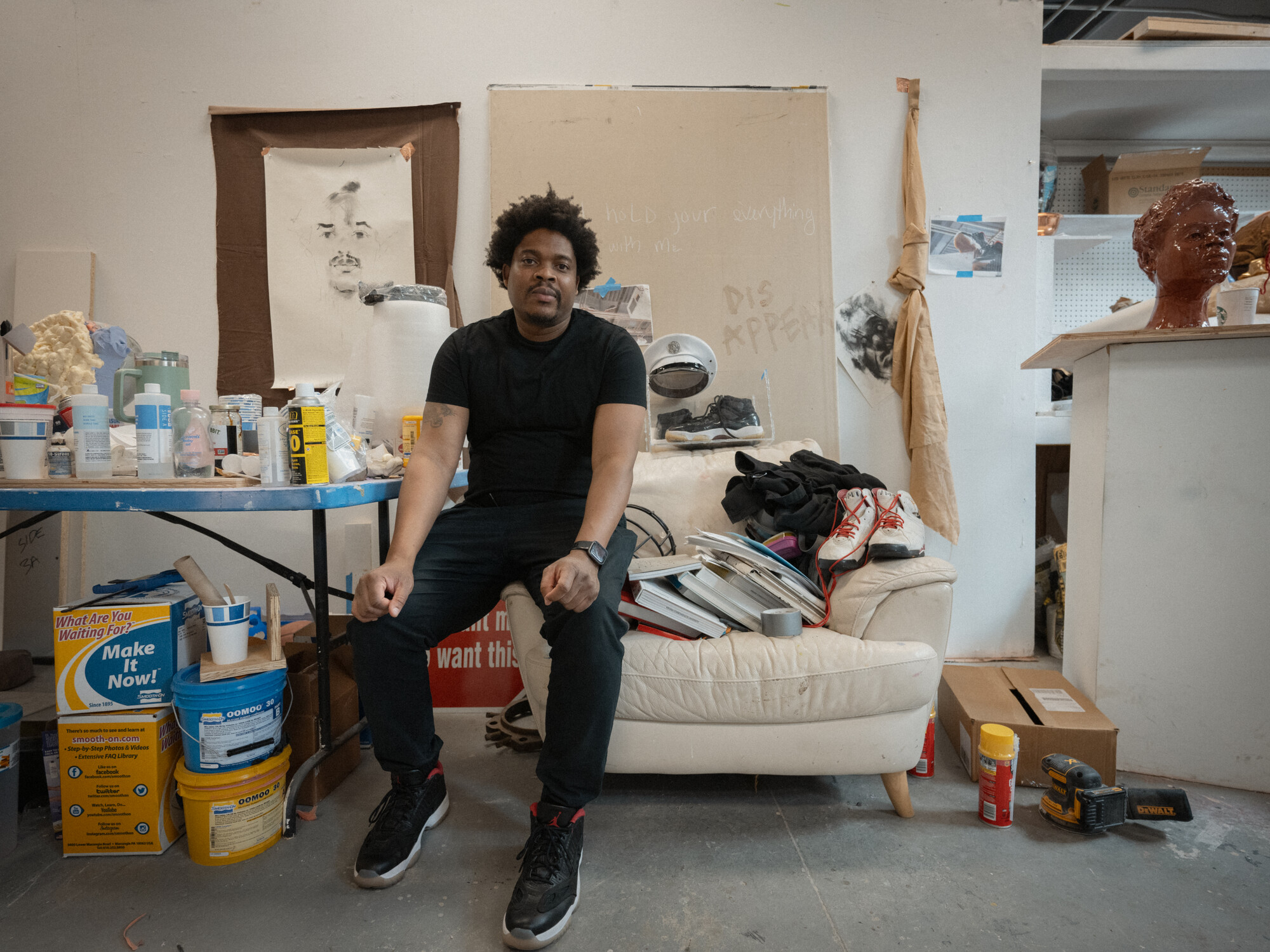 Sculpture + Extended media graduate student Jermaine Ollivierre photographed in his Graduate Studio.