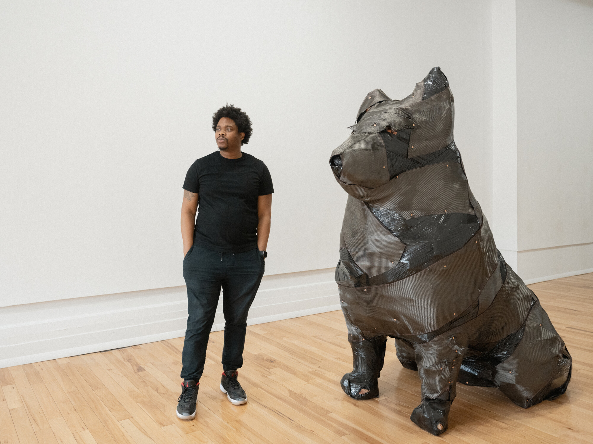 Sculpture + Extended media graduate student Jermaine Ollivierre photographed in his Graduate Studio.