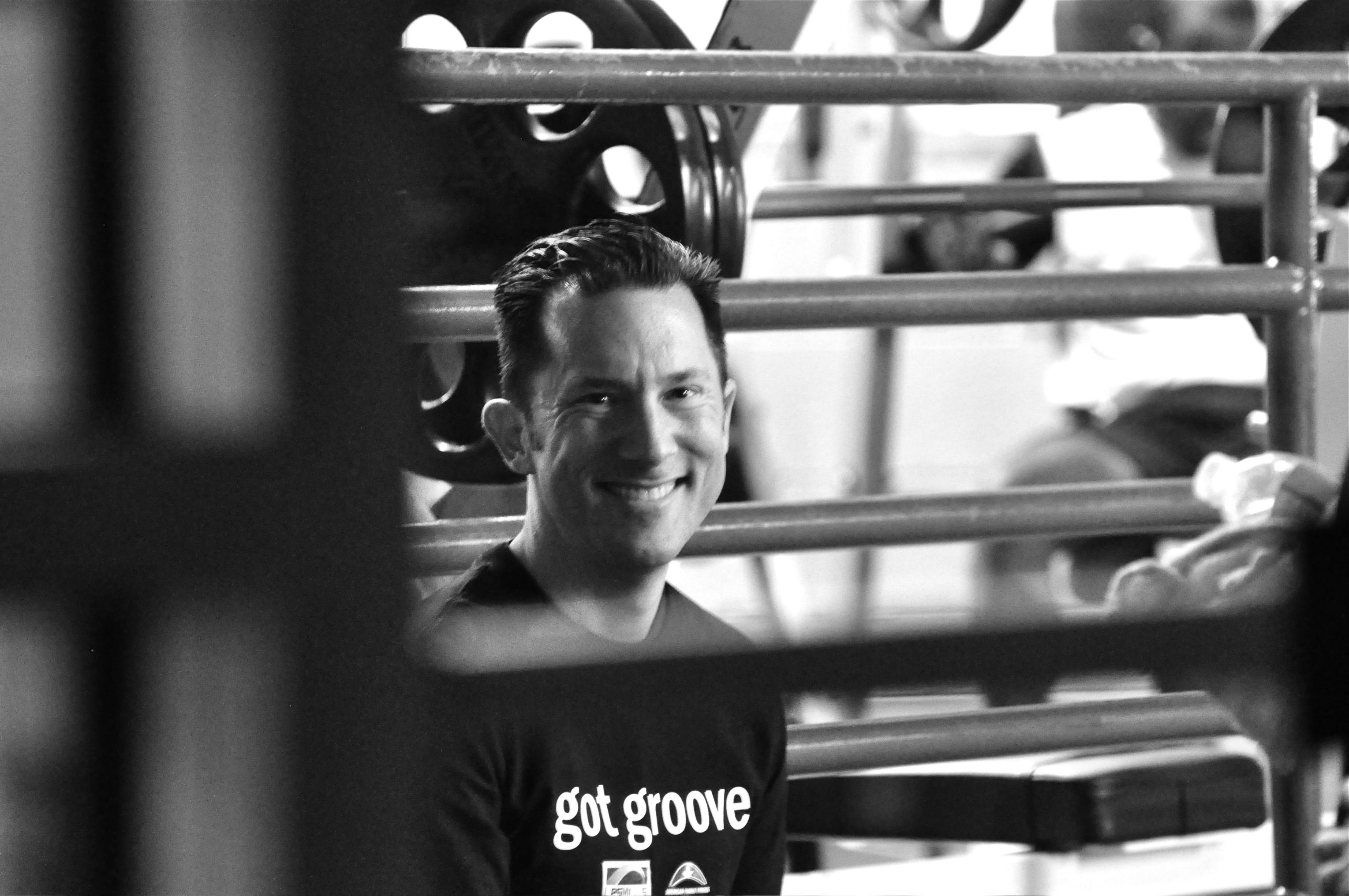 man smiling in gym