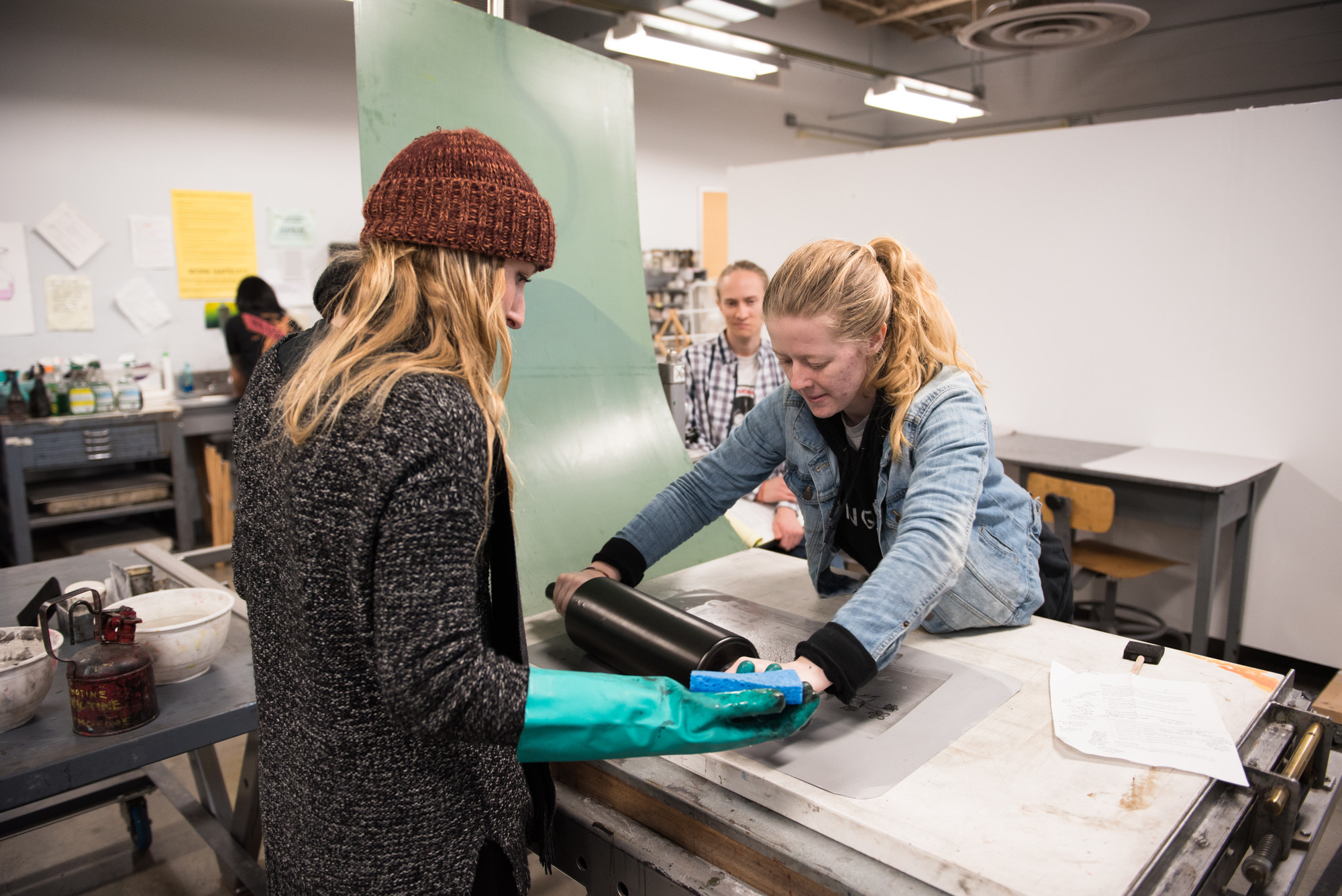 student working in print making studio