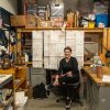 A craft graduate student in her studio