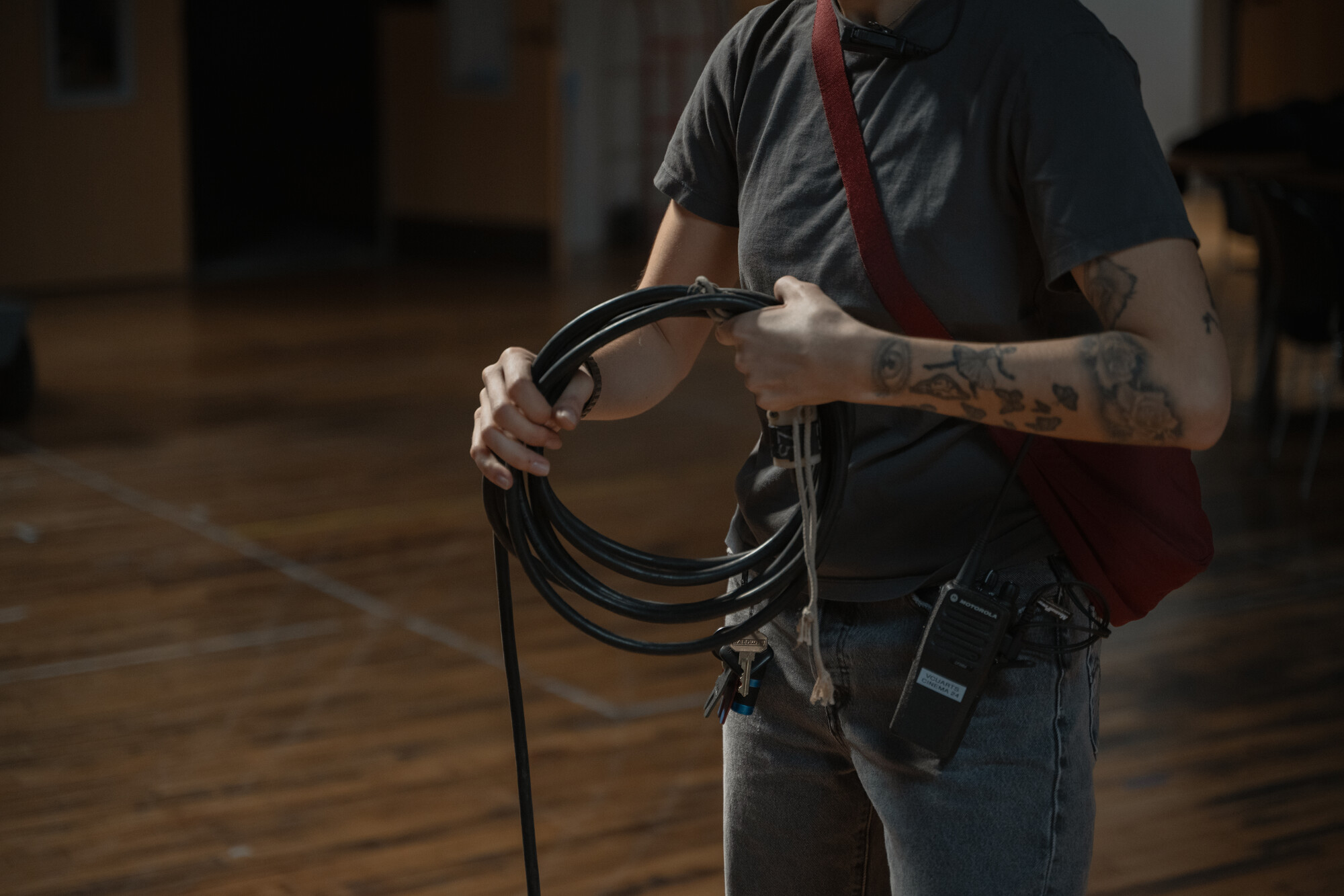 Cinema student wrapping up cabling