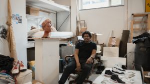 Sculpture + Extended media graduate student Jermaine Ollivierre photographed in his Graduate Studio