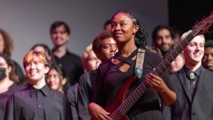 v c u arts music student playing the bass guitar