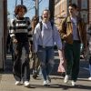 Students walking on the sidewalk on their way to class