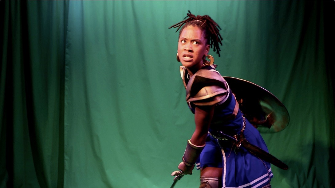 person in front of green screen