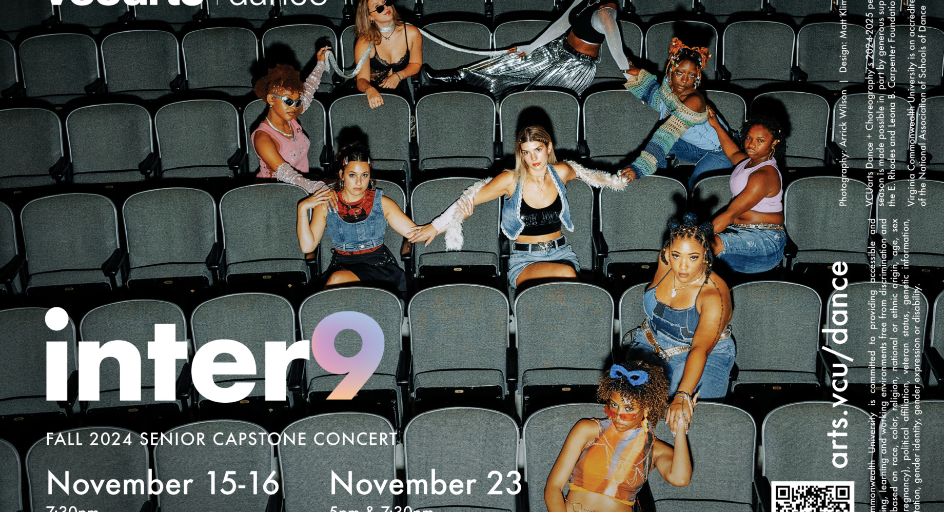 dance students sitting in auditorium style sitting posing in costume and looking at the camera