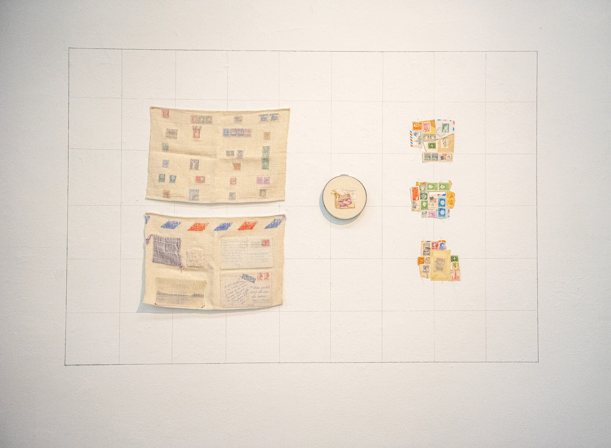 This is a map; a memory. Used stamps are woven into double-cloth pockets, embroidered, and stitched together, to think about all stamps ever sent and messages received across impossible distances.