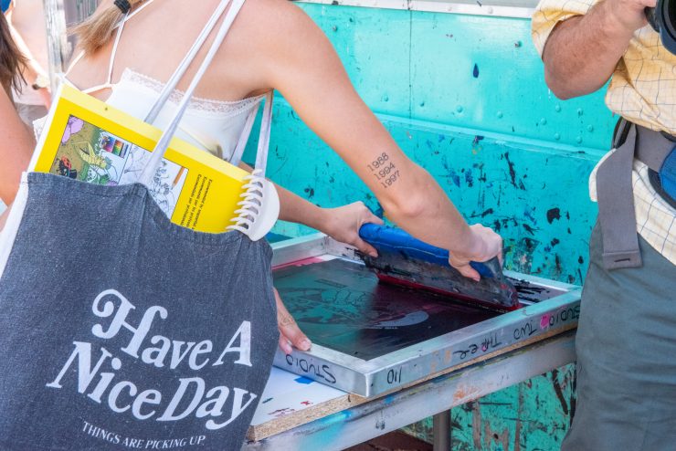 Student pulling screen print