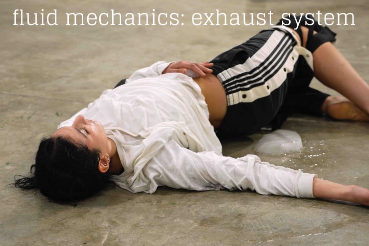 An image of a person lying on the floor with the text "Fluid Mechanics: Exhaust System"